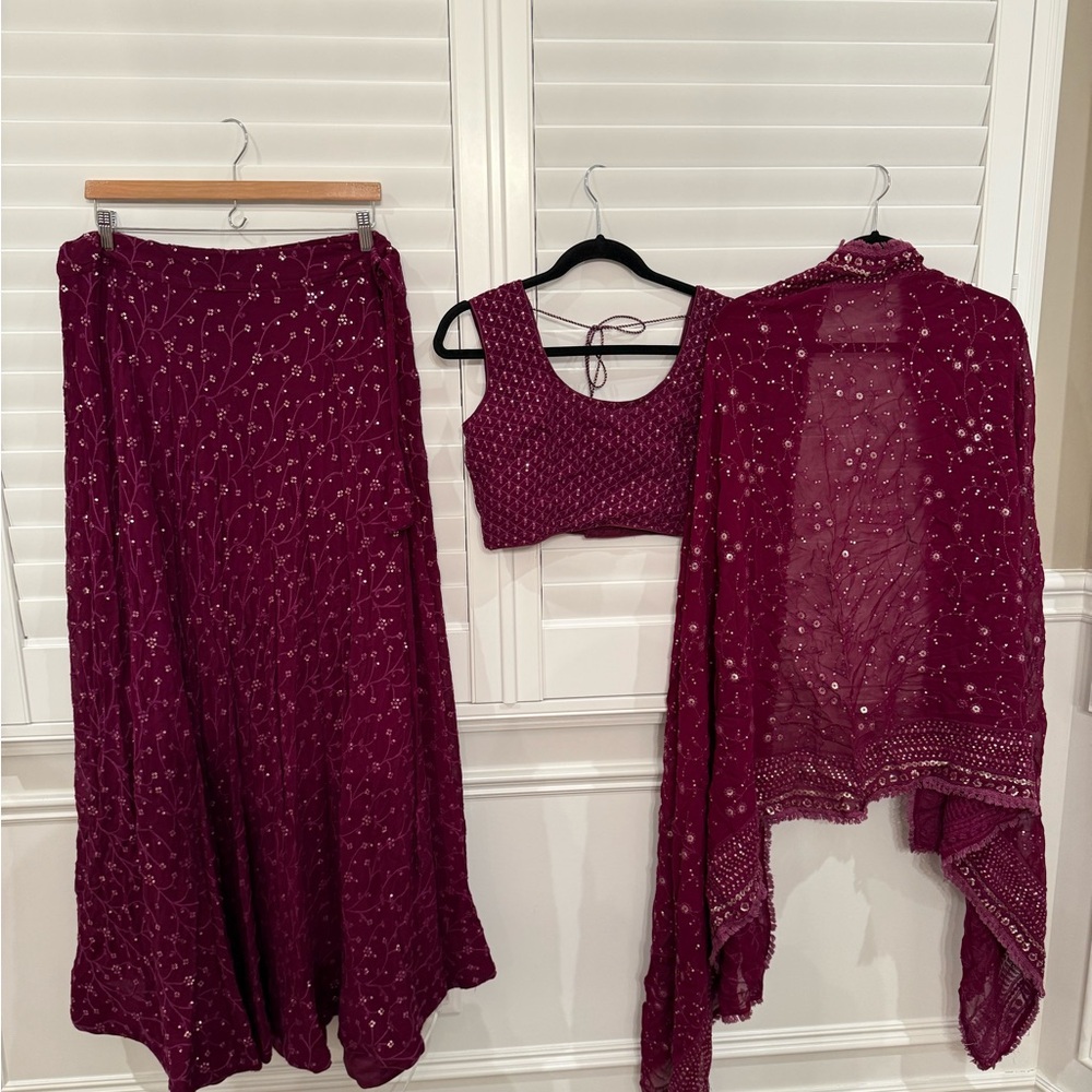 Beautiful magenta purple lengha with thread work.